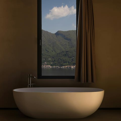Relax in the freestanding bath at the end of another perfect day in Lombardy