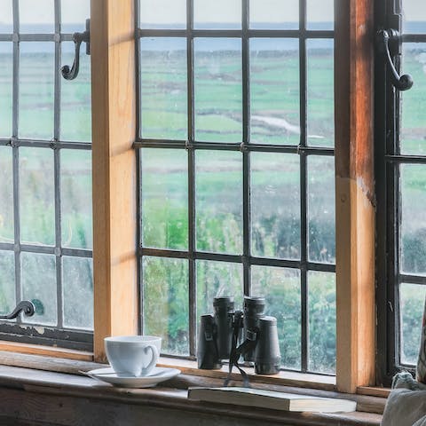 Soak up the breathtaking countryside views over the fields and out to sea