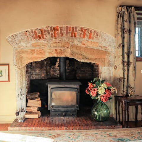 Get cosy in front of the wood burner fire on cold winter's evenings