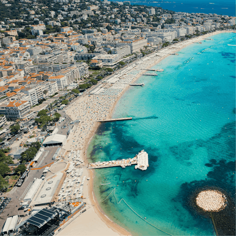 Relax on a sun lounger at the iconic La Croisette beach
