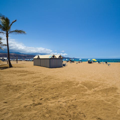 Sink your toes into sand – the beach is just steps away