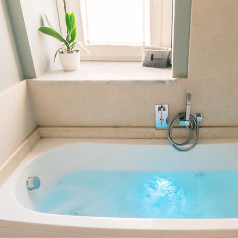 Relax in the jacuzzi bath after a day of sightseeing