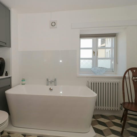 Soak in the freestanding bath after a busy day of sightseeing
