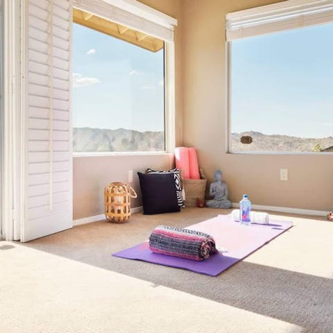 De-stress with some yoga and admire the mountain views