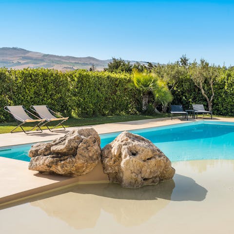 Trade the Sicilian heat for the cool waters of the crystalline pool