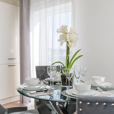 Host dinner and drinks in the elegant dining space