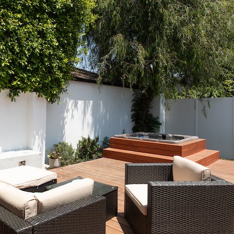 Keep the night flowing in the private hot tub