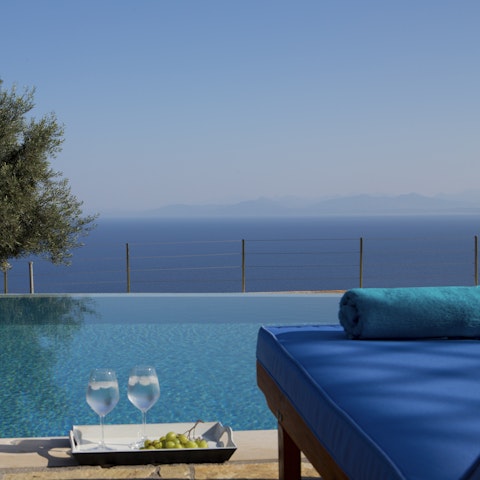 Glide gracefully through the infinity pool and retire to a lounger afterwards