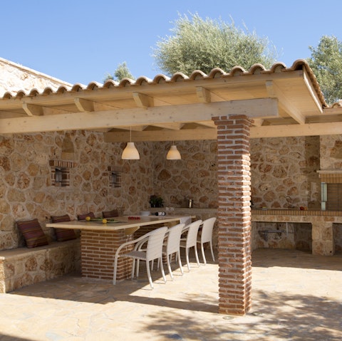 Cook up a storm in the covered outdoor kitchen and dine alfresco at golden hour