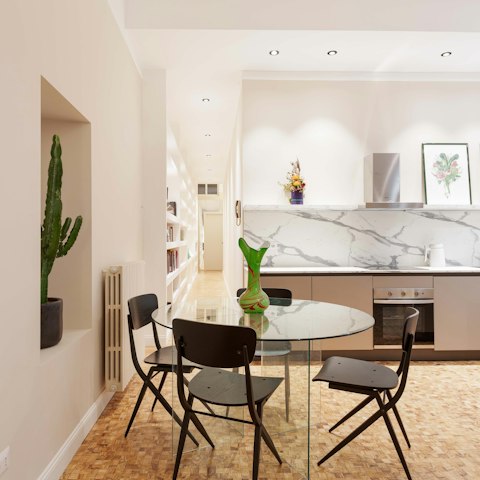Enjoy a light bite and a glass of wine around the table