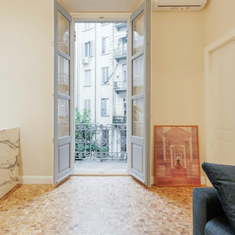 Open the doors to the Juliet balcony and feel the fresh air