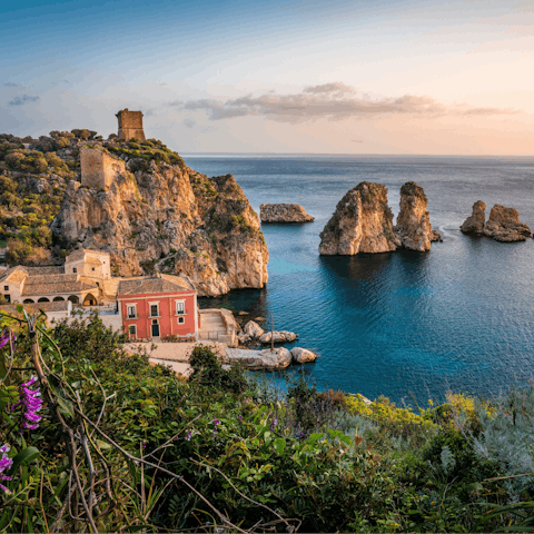 Make the twenty-minute walk to the pretty coastal village of Scopello