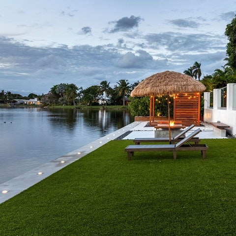 Stretch out on the lawn with tranquil lake views