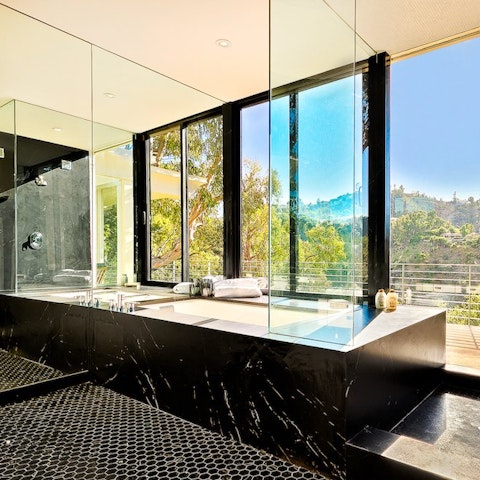 Admire the views from the deluxe hot tub