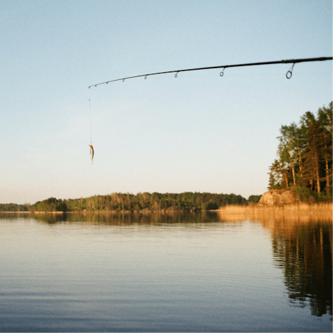 Give fishing a whirl –⁠ the nearby river has a run of salmon in summer months