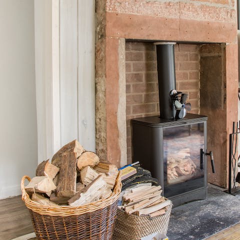 Snuggle up beside the wood-burner fire