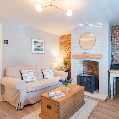 Get cosy on your plush sofa beside the fire
