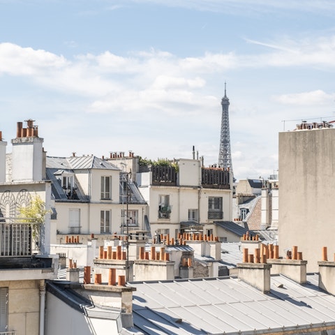 Enjoy the distant views of the Eiffel Tower from the balcony