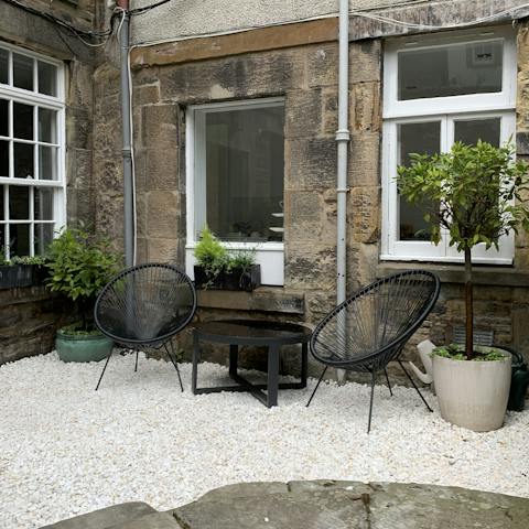 Take tea for two outside in the private outdoor area