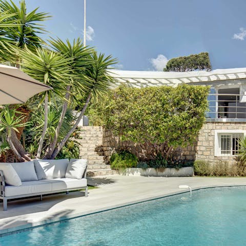 Lounge in pure bliss around the garden swimming pool
