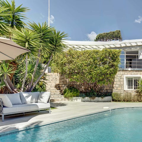 Lounge in pure bliss around the garden swimming pool