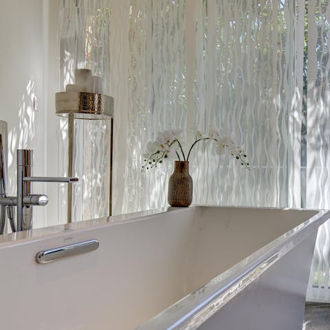 Fill the luxurious bath with bubbles and soak