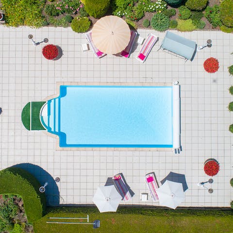 Lounge by the pristinely maintained pool