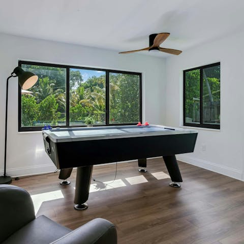 Have a friendly game of air hockey at the dedicated table