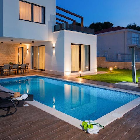 Cool off with a dip in the crystalline waters of the private outdoor pool