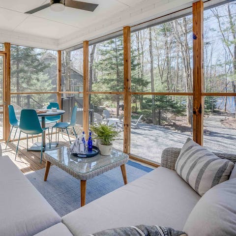 Curl up with a book and a glass of wine in the enclosed porch