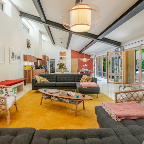 Have a glass of Champagne in the bright living room