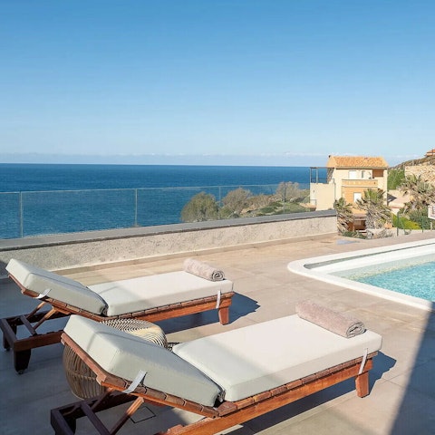 Soak up the sun by the private pool