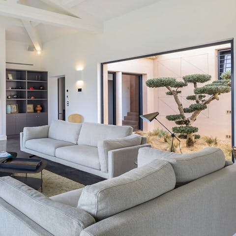 Relax in the living room with a glass of Champagne