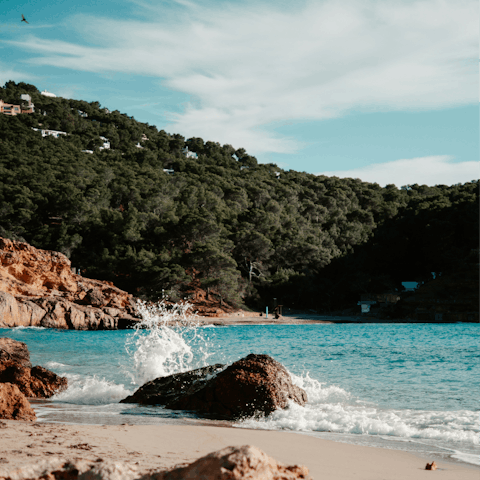 Watch the sunset at Cala Conta, not far away
