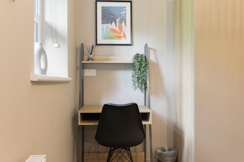 Work from home at the desk in the bedroom