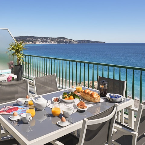 Dine alfresco and admire the panoramic sea views