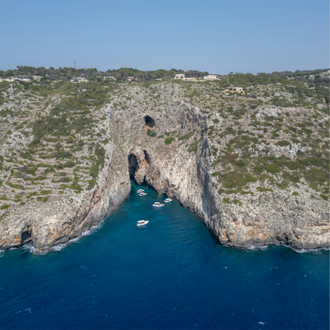 Explore the sea caves around nearby Santa Maria di Leuca