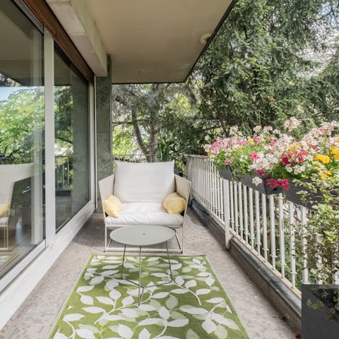 Take in the beatiful views of the treetops from the wrap-around balcony