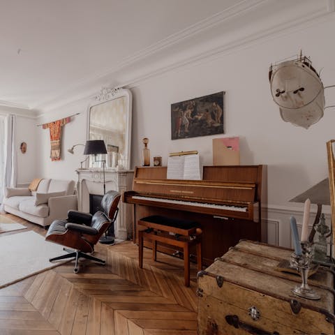 Tickle the ivories on the piano in the living area