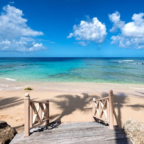 Hop out of bed and straight to the beach for morning swims in the Caribbean