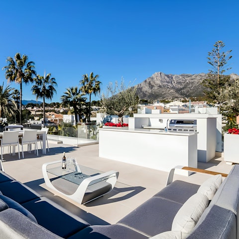 Head up to the roof terrace for sunsets overlooking the mountains