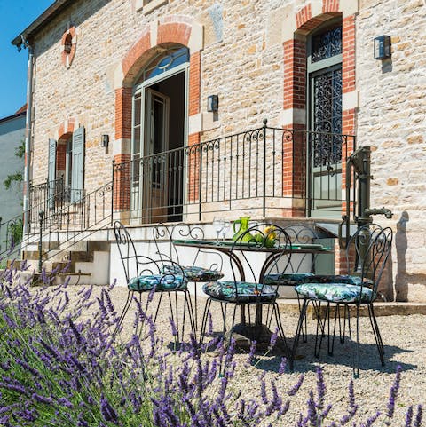 Sit out in the sun and enjoy an alfresco lunch an a kir cocktail