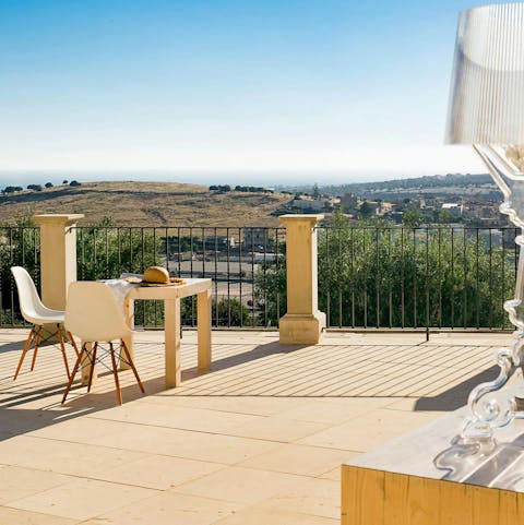 Admire town and country views from the sun-kissed terrace