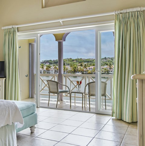 Pause for a quiet moment on bedroom balconies overlooking the ocean