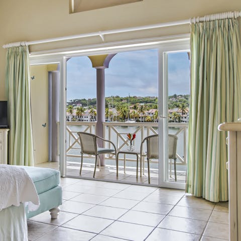 Pause for a quiet moment on bedroom balconies overlooking the ocean