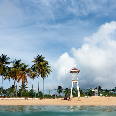 Head to the soft sand of Reduit Beach, a short walk away