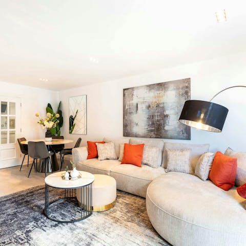 Sink into the designer sofa and rest weary feet