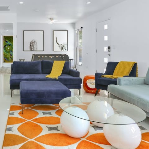 Admire the playful retro-style furniture throughout the home