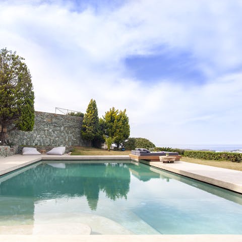 Soak up pristine views from the swimming pool