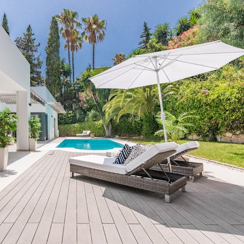 Soak up the lush green scenes and sunshine from the stylish terraces